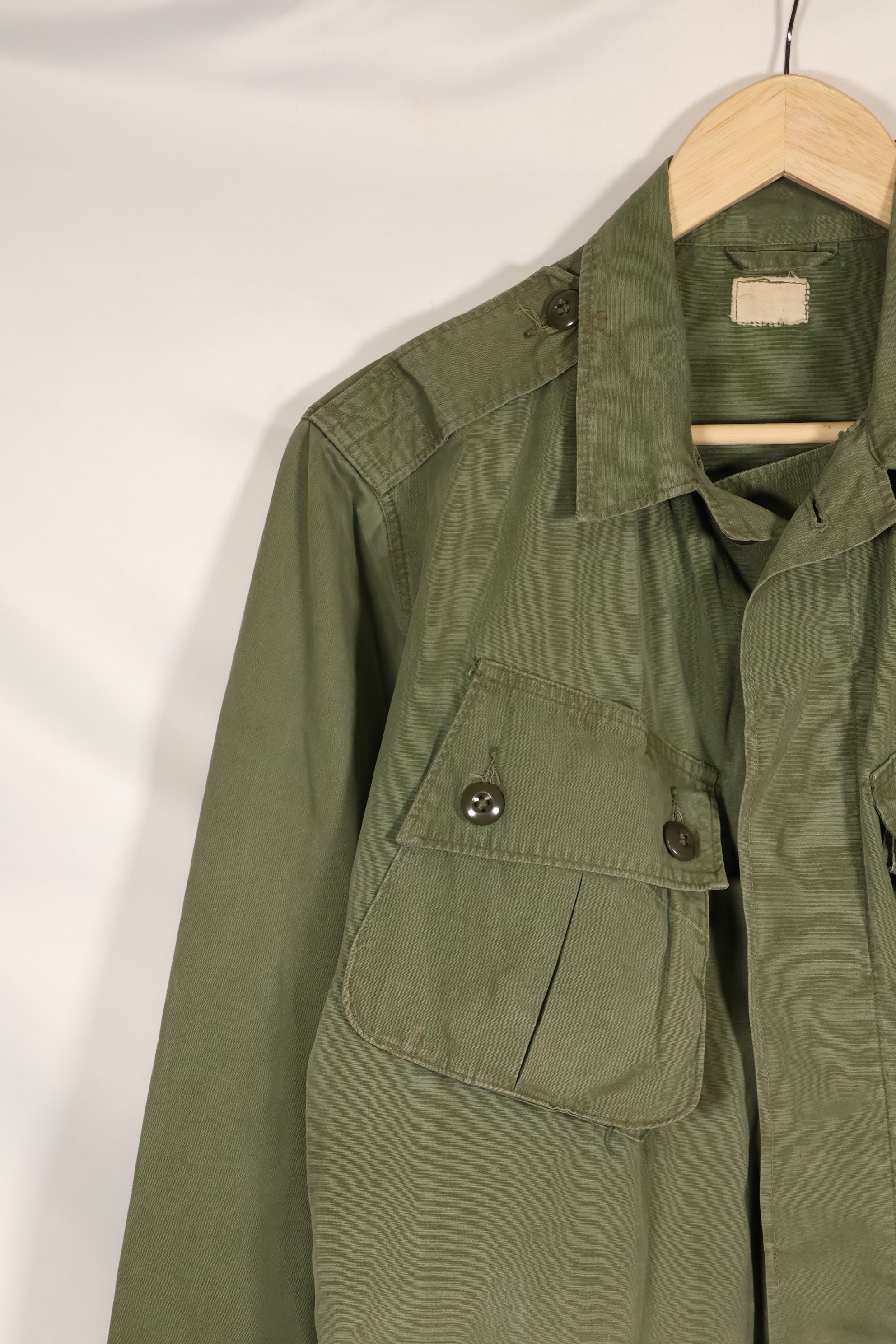 Estimated 1963, Estimated S-S 1st Model Jungle Fatigue Jacket, Scratched, Used.