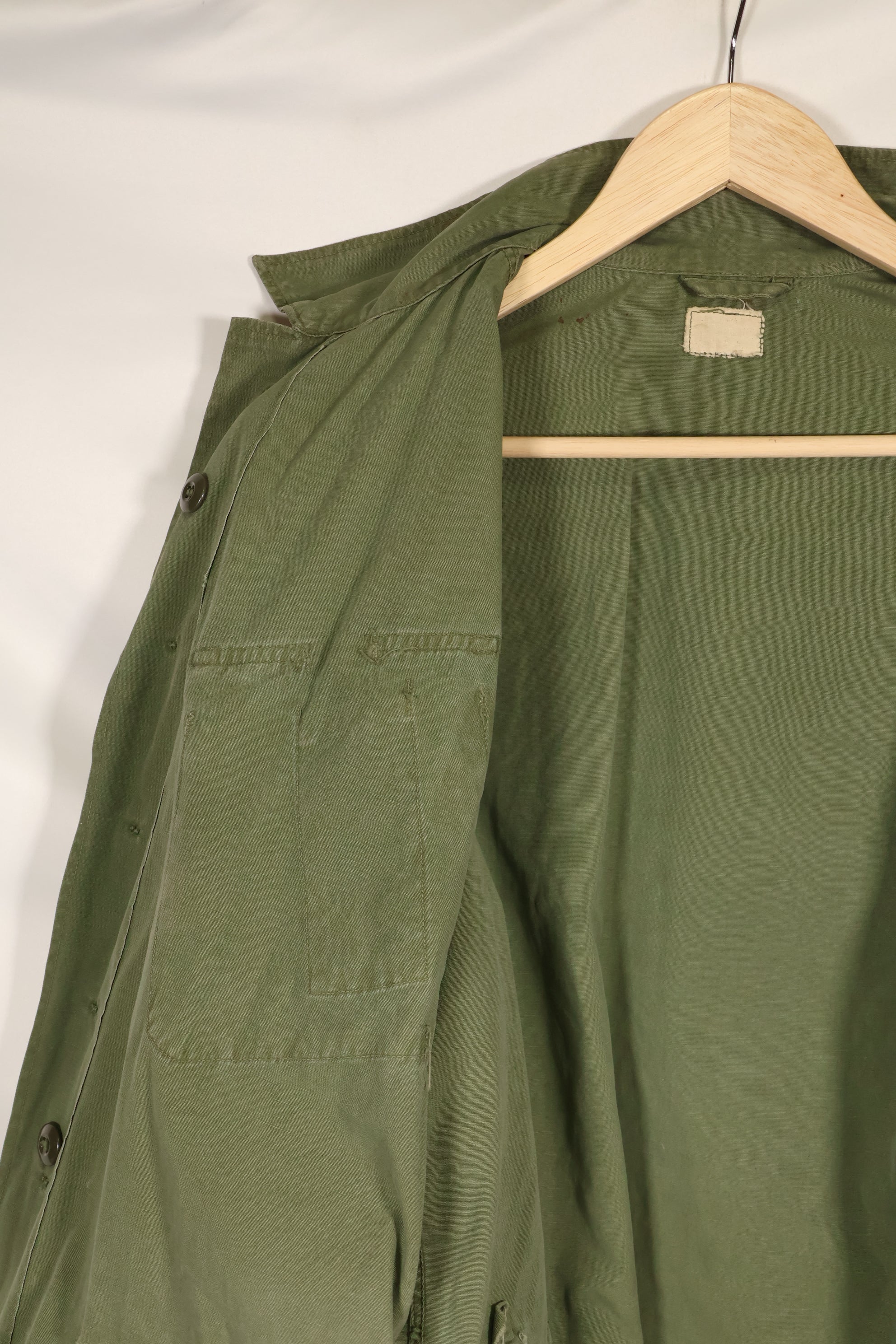 Estimated 1963, Estimated S-S 1st Model Jungle Fatigue Jacket, Scratched, Used.