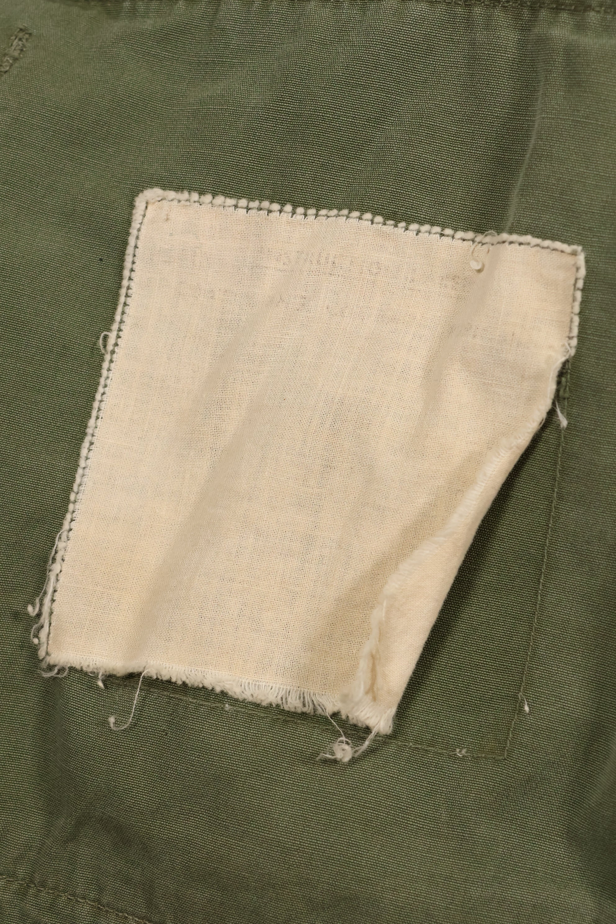 Estimated 1963, Estimated S-S 1st Model Jungle Fatigue Jacket, Scratched, Used.