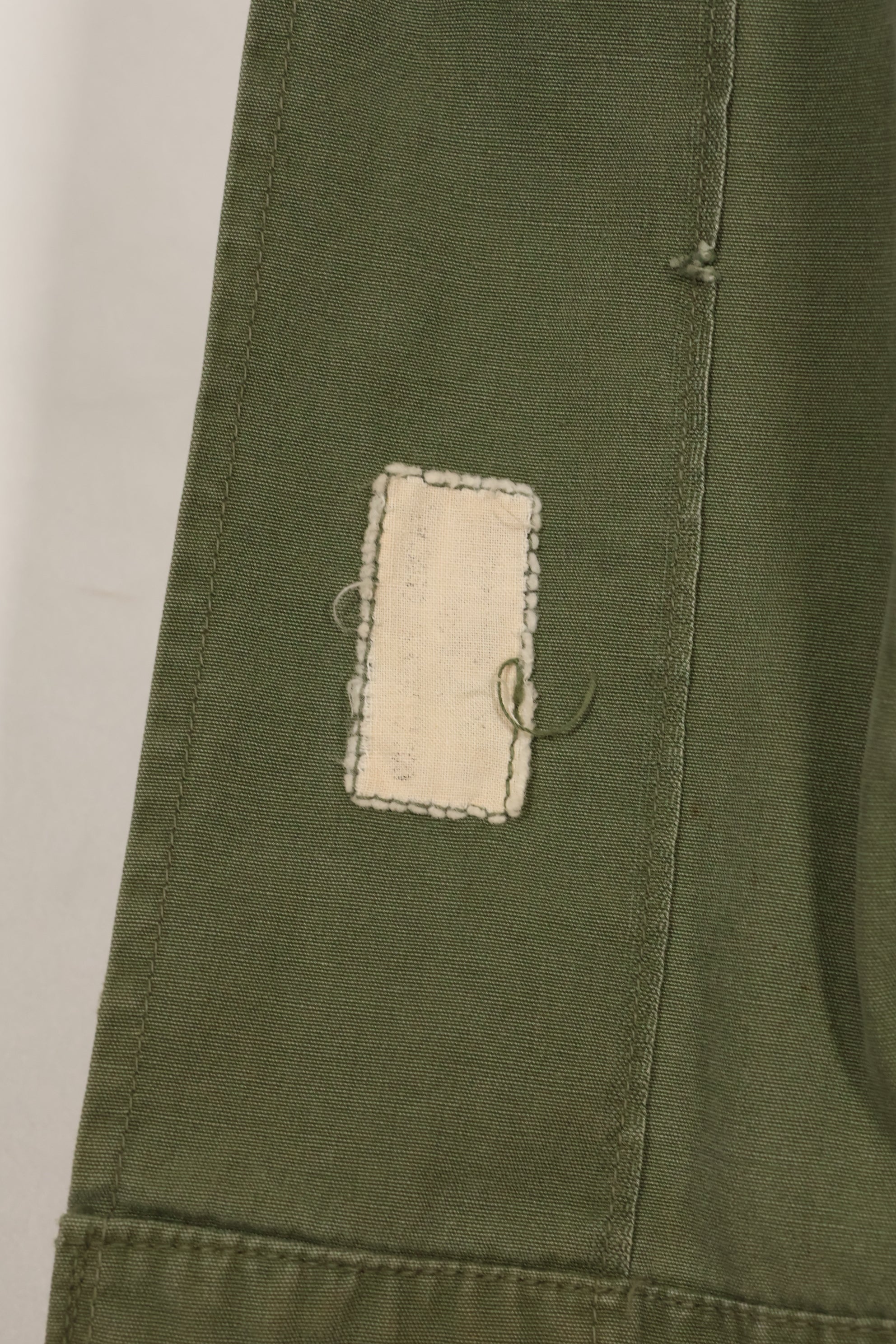 Estimated 1963, Estimated S-S 1st Model Jungle Fatigue Jacket, Scratched, Used.