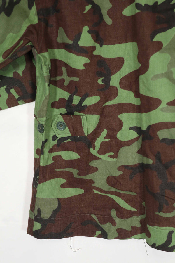 Real Unused South Vietnamese Ranger leaf camouflage jacket with short sleeves.