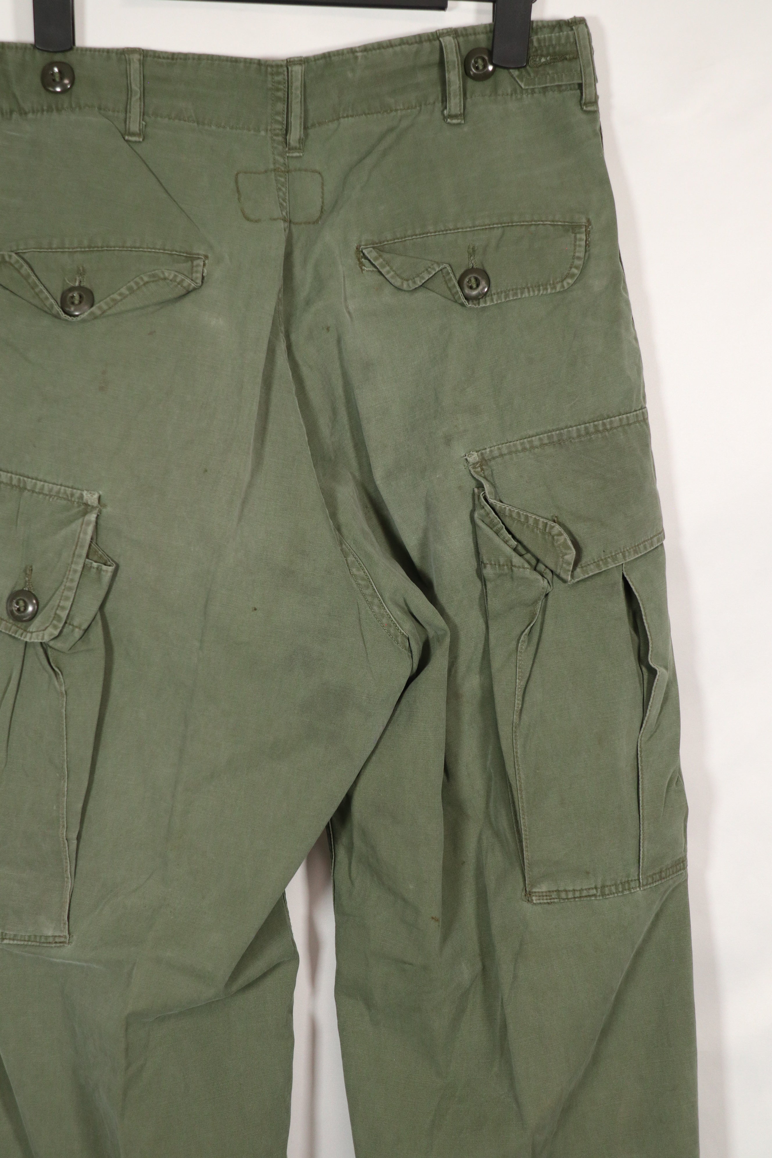 Real 1963 1st Model Jungle Fatigue Pants without leg ties, used.