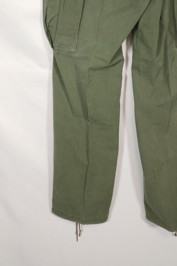 Real 1963 1st Model Jungle Fatigue Pants without leg ties, used.