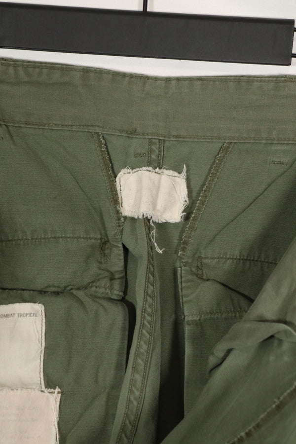 Real 1963 1st Model Jungle Fatigue Pants without leg ties, used.