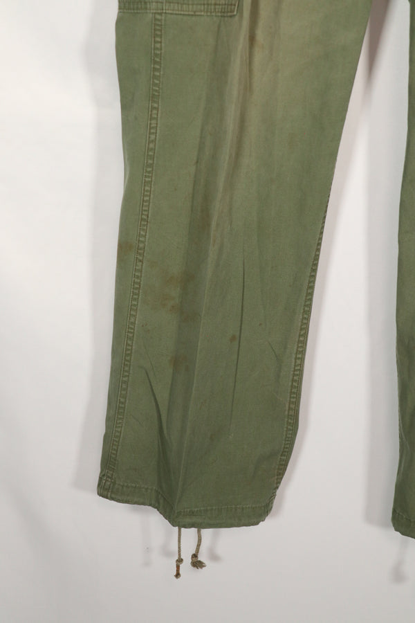 Real 1963 1st Model Jungle Fatigue Pants with leg ties, used.