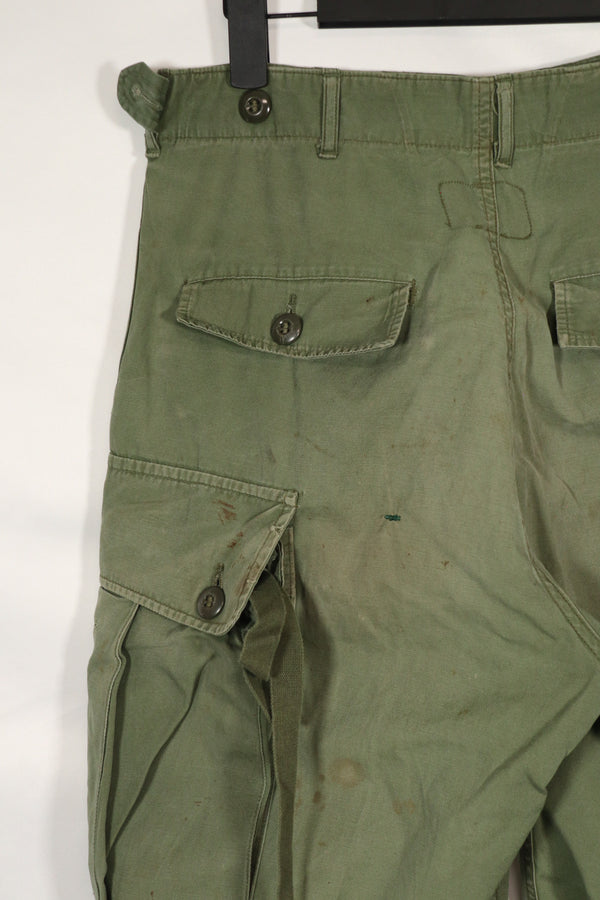 Real 1963 1st Model Jungle Fatigue Pants with leg ties, used.