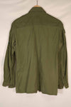 Real 1970 Australian Army OD Fatigue shirt with rank insignia, size unreadable.