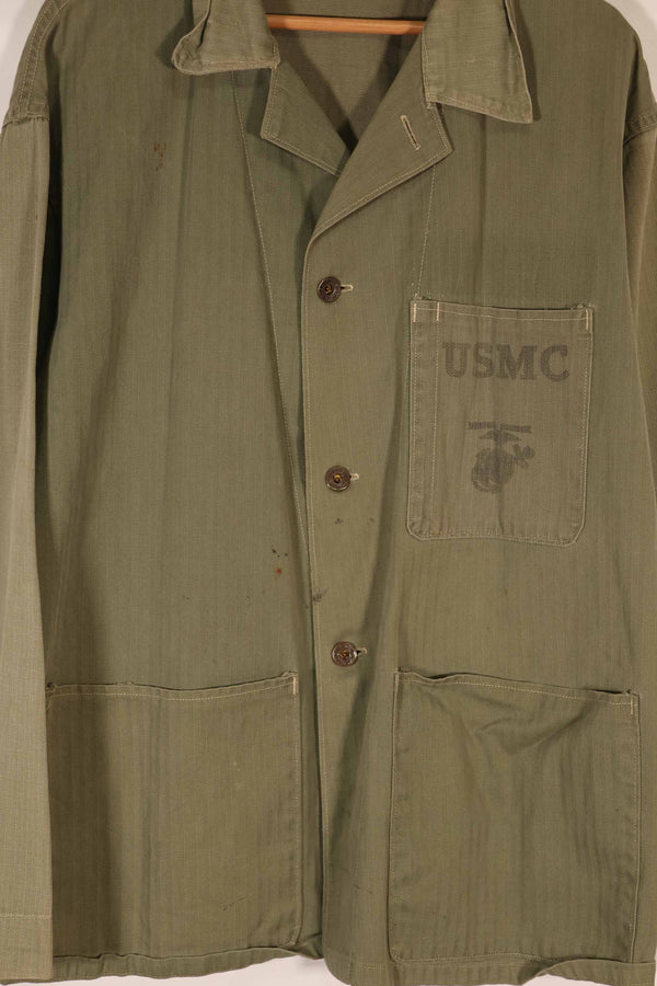 Real 1940s U.S. Marine Corps USMC M41 HBT utility jacket, faded, stained.