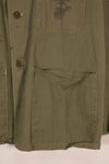 Real 1940s U.S. Marine Corps USMC M41 HBT utility jacket, faded, stained.