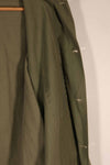 Real 1940s U.S. Marine Corps USMC M41 HBT utility jacket, faded, stained.