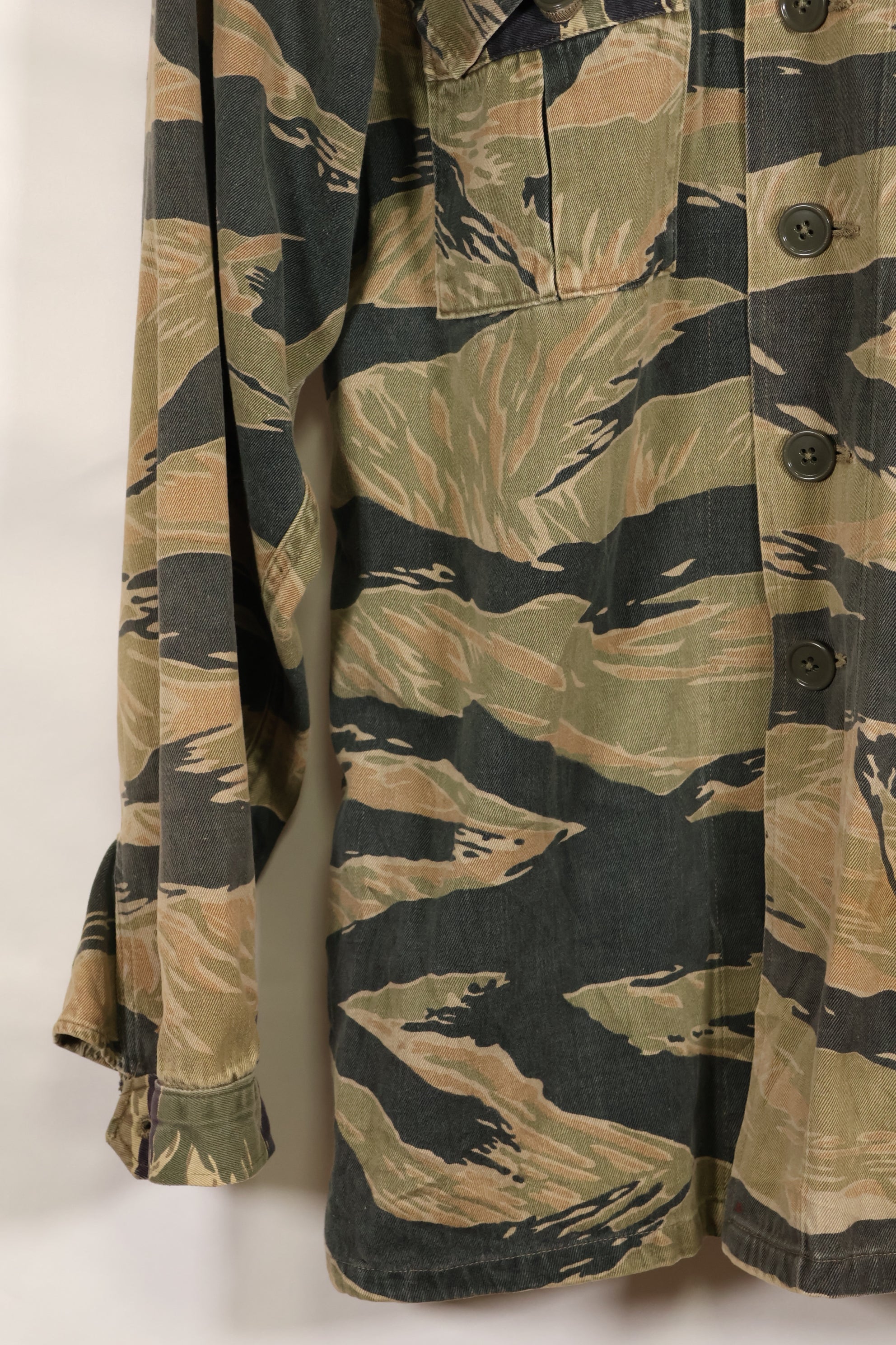 Estimated late 1960s-1970s locally made tiger stripe shirt, used.