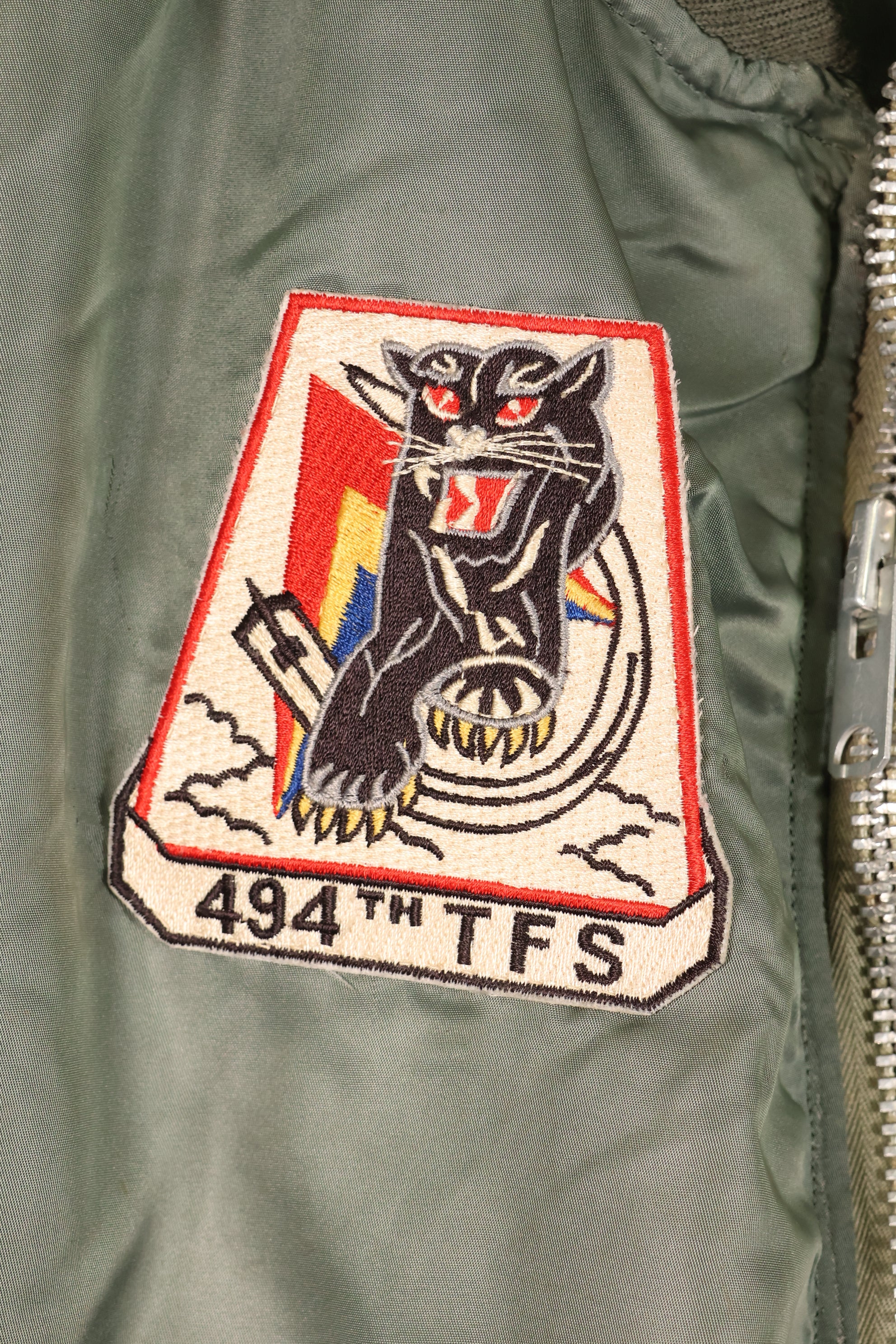 1950s, estimated size 40–42, U.S. Air Force B-15D flight jacket, modified with shearling, includes patches, used