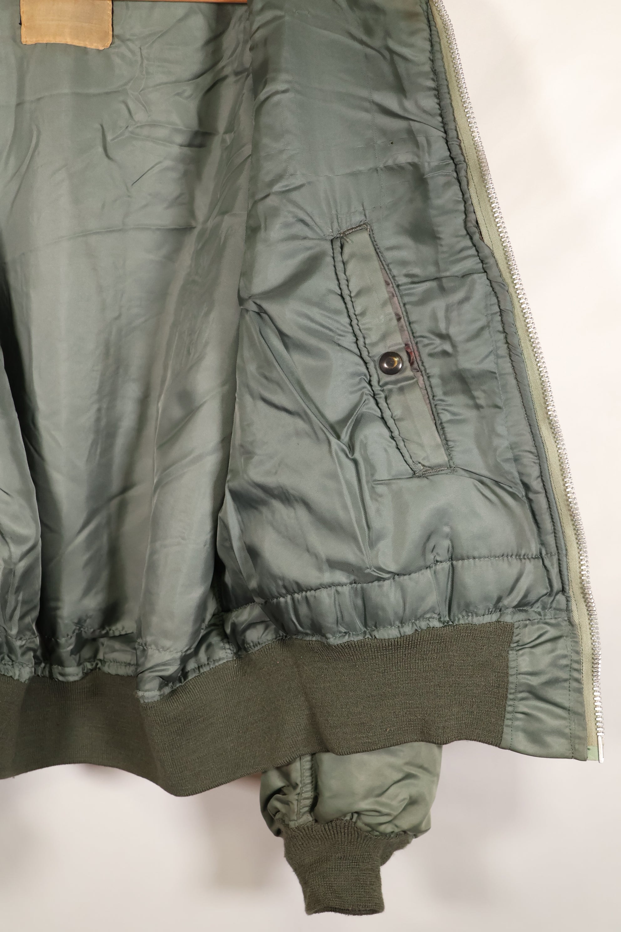 1950s, estimated size 40–42, U.S. Air Force B-15D flight jacket, modified with shearling, includes patches, used