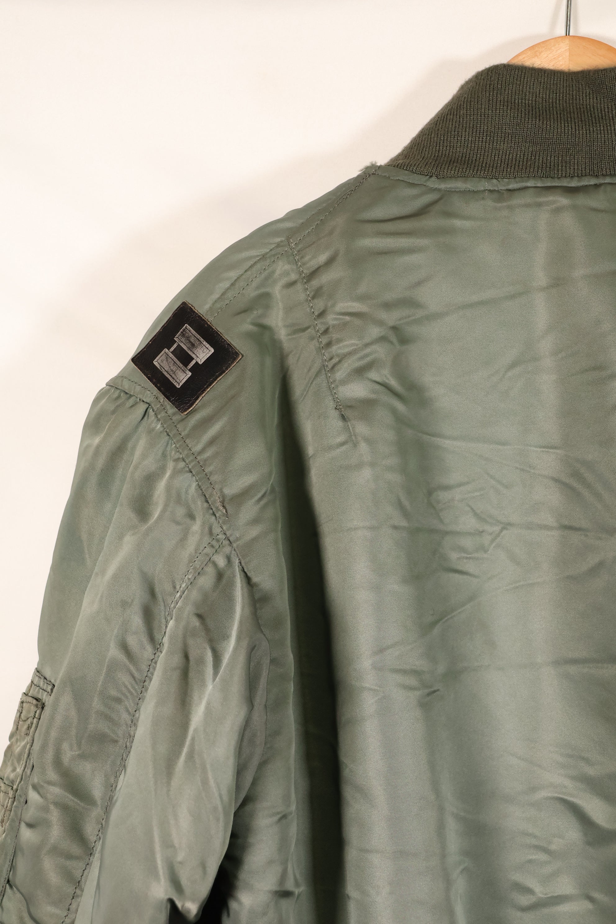 1950s, estimated size 40–42, U.S. Air Force B-15D flight jacket, modified with shearling, includes patches, used