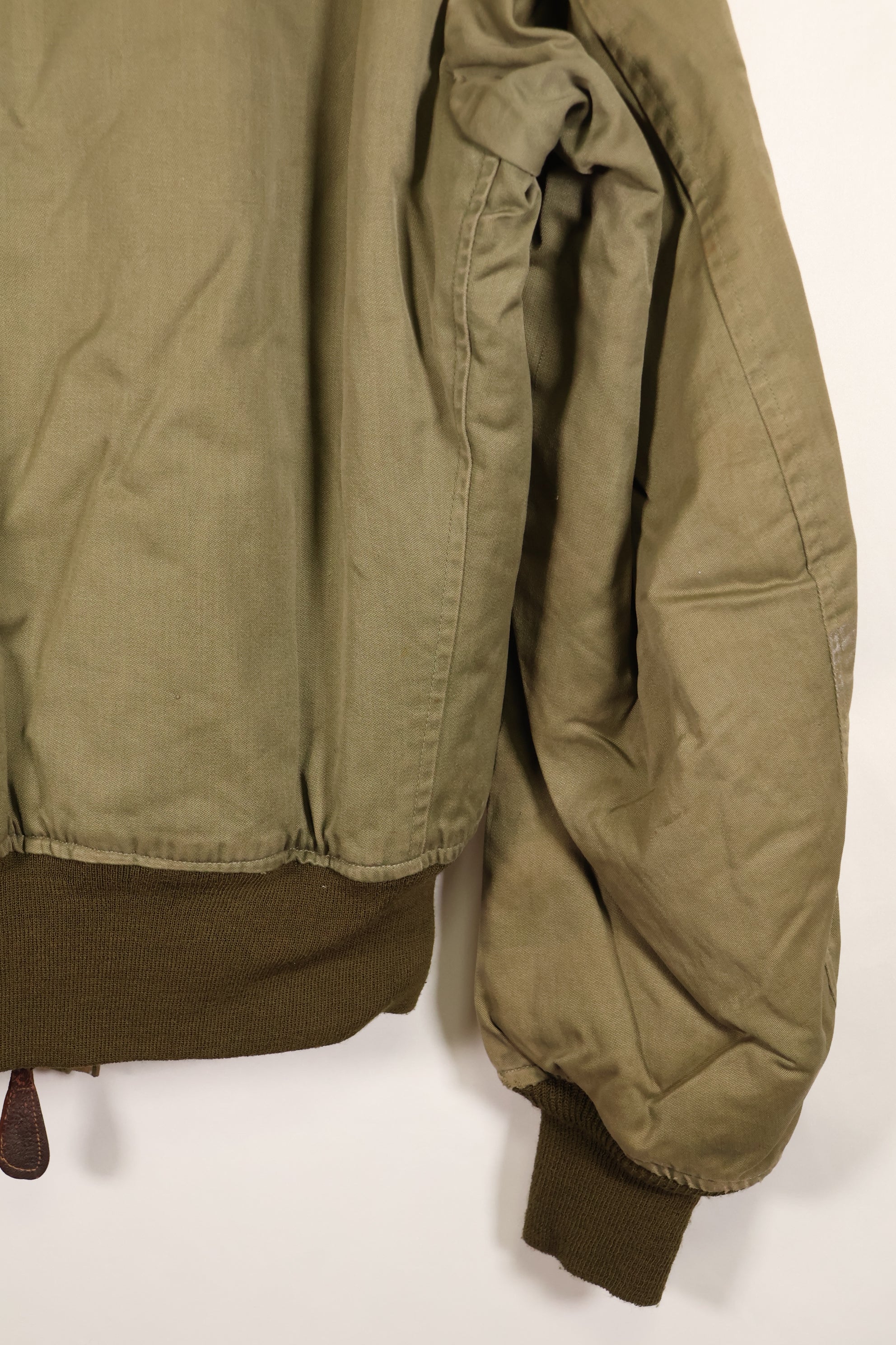 1940s, estimated age 38–40, U.S. Army Air Forces (USAAF) B-15A flight jacket, modified with shearling, used