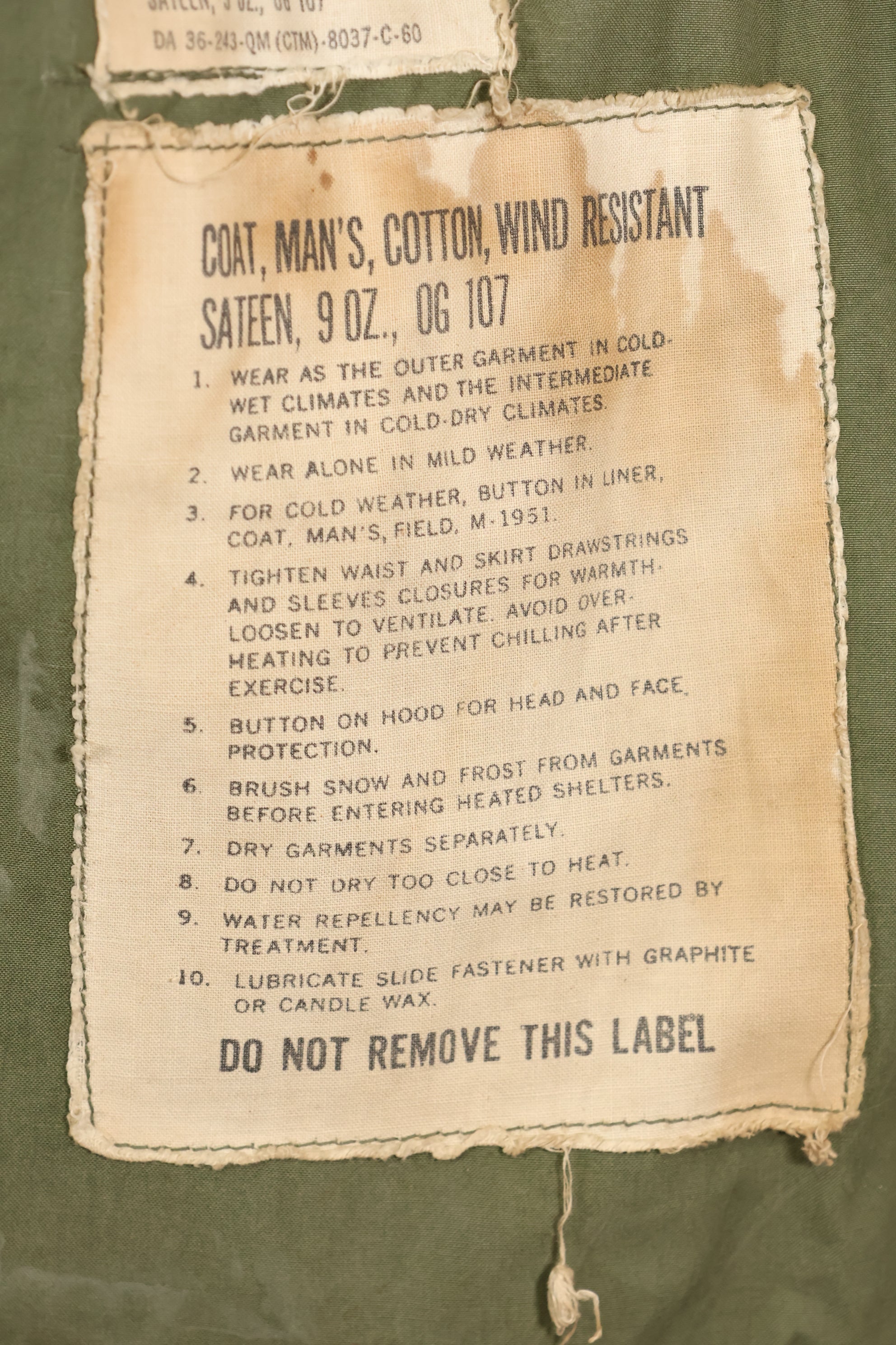 1960 Contract S-S U.S. Army M51 Field Jacket, stained, used.