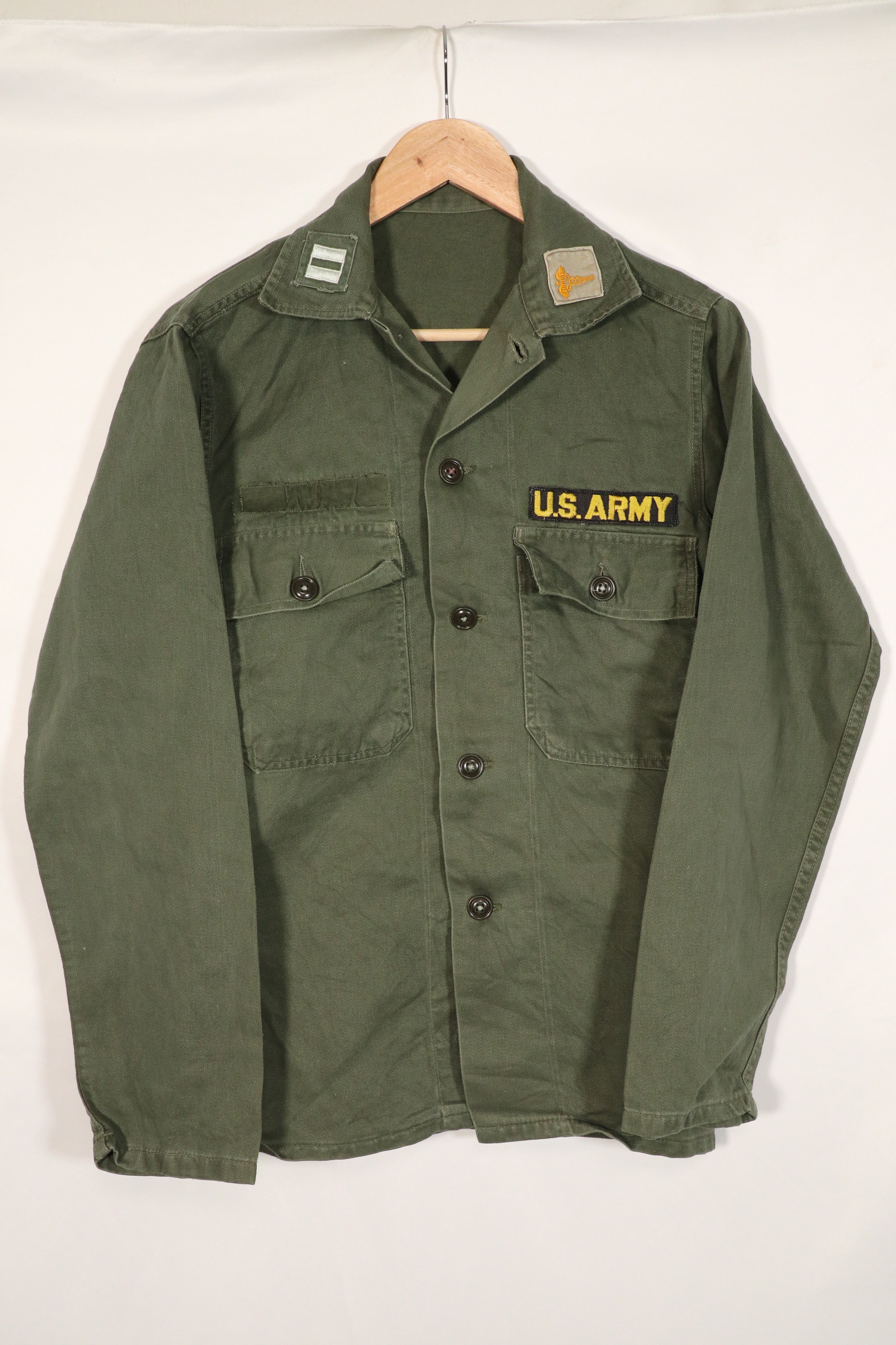 Real U.S. Army OG-107 Utility Shirt with insignia, retrofitted, used.