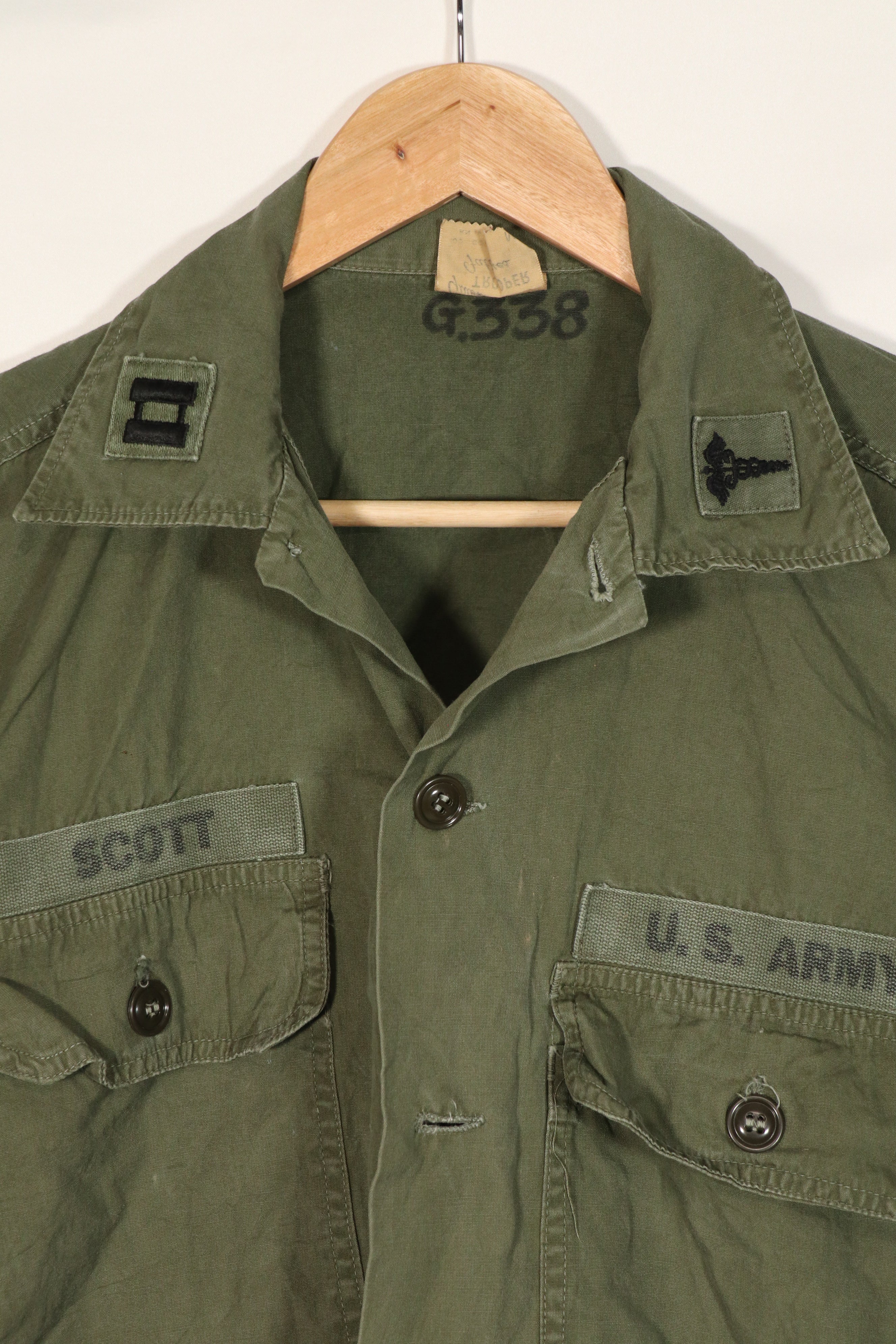 Real U.S. Army OG-107 PX utility shirt made by Poplin, used, patch retrofitted.