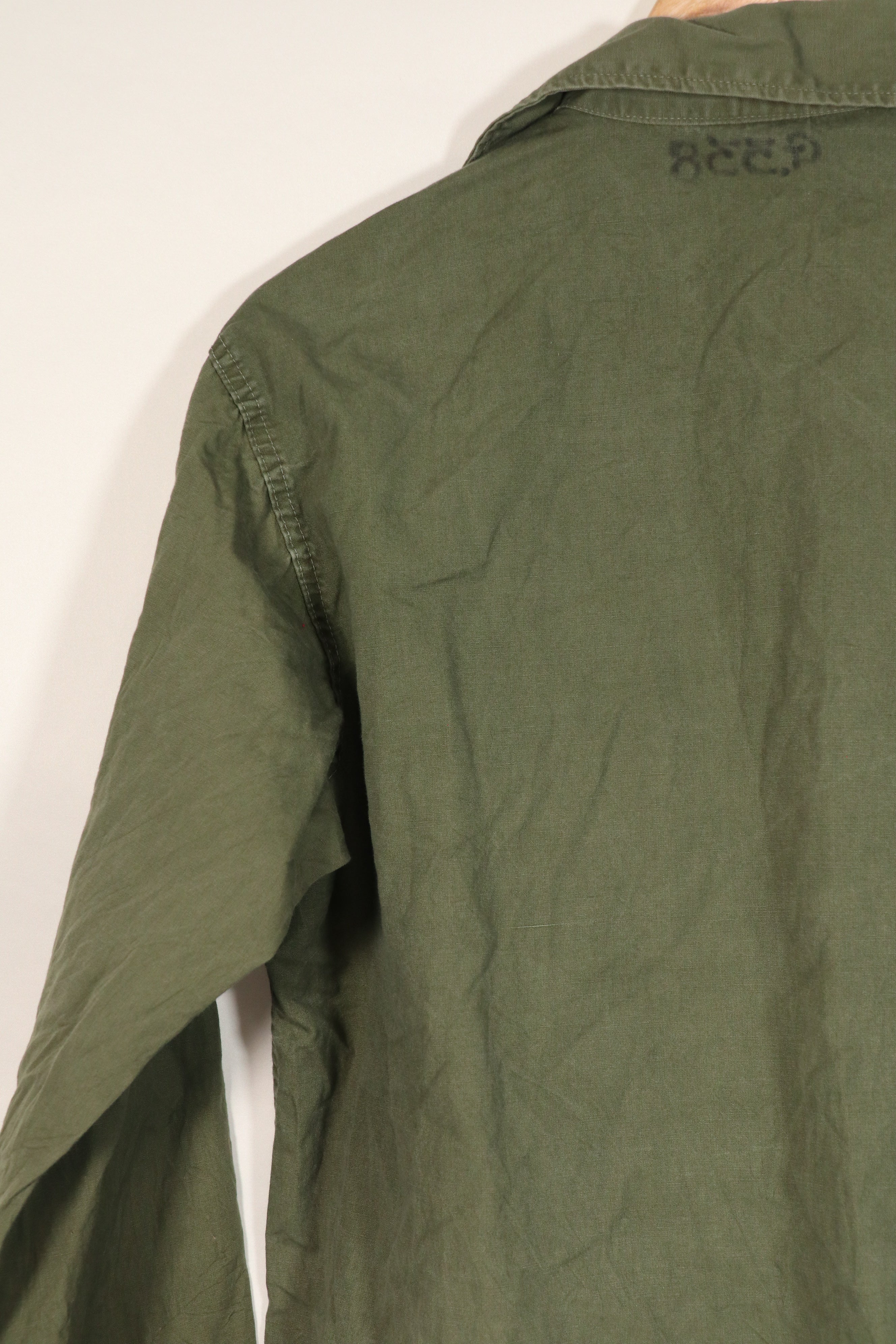 Real U.S. Army OG-107 PX utility shirt made by Poplin, used, patch retrofitted.