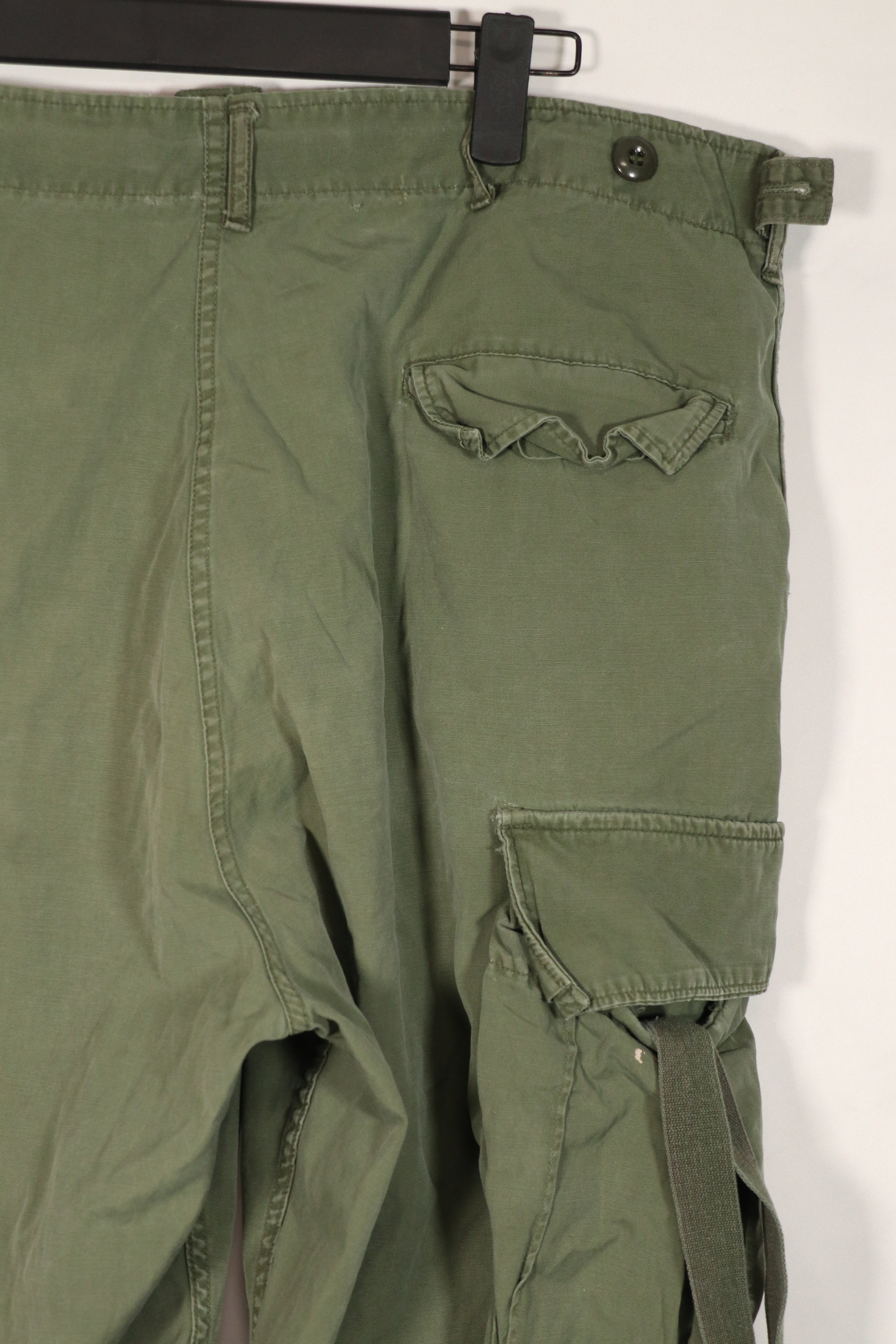 Real 2nd Model Jungle Fatigue Pants with leg ties, large size, stained, used.