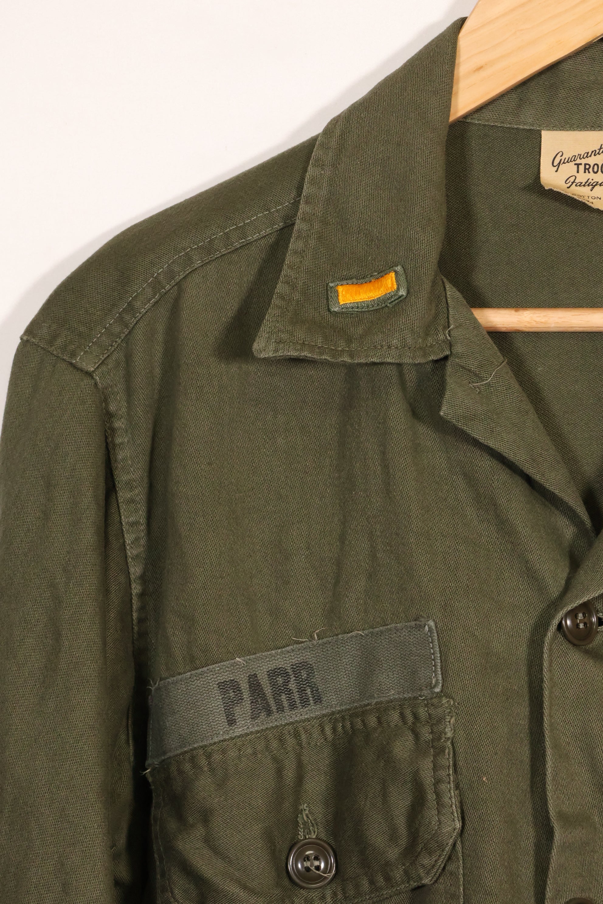 1960s-70s OG-107 utility shirt, Army paratrooper, patch first attached, used.