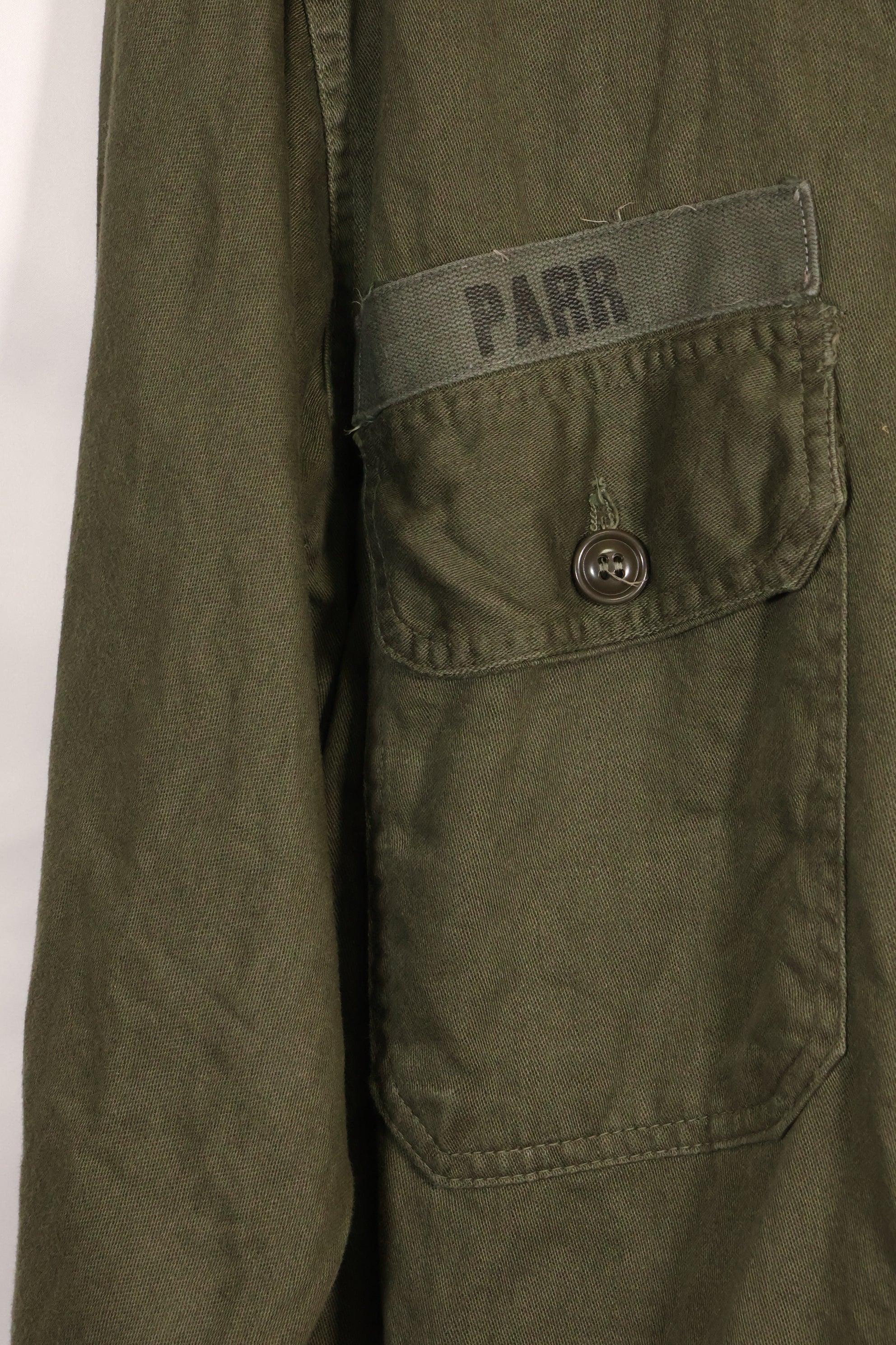 1960s-70s OG-107 utility shirt, Army paratrooper, patch first attached, used.