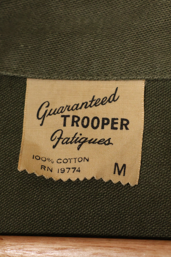 1960s-70s OG-107 utility shirt, Army paratrooper, patch first attached, used.