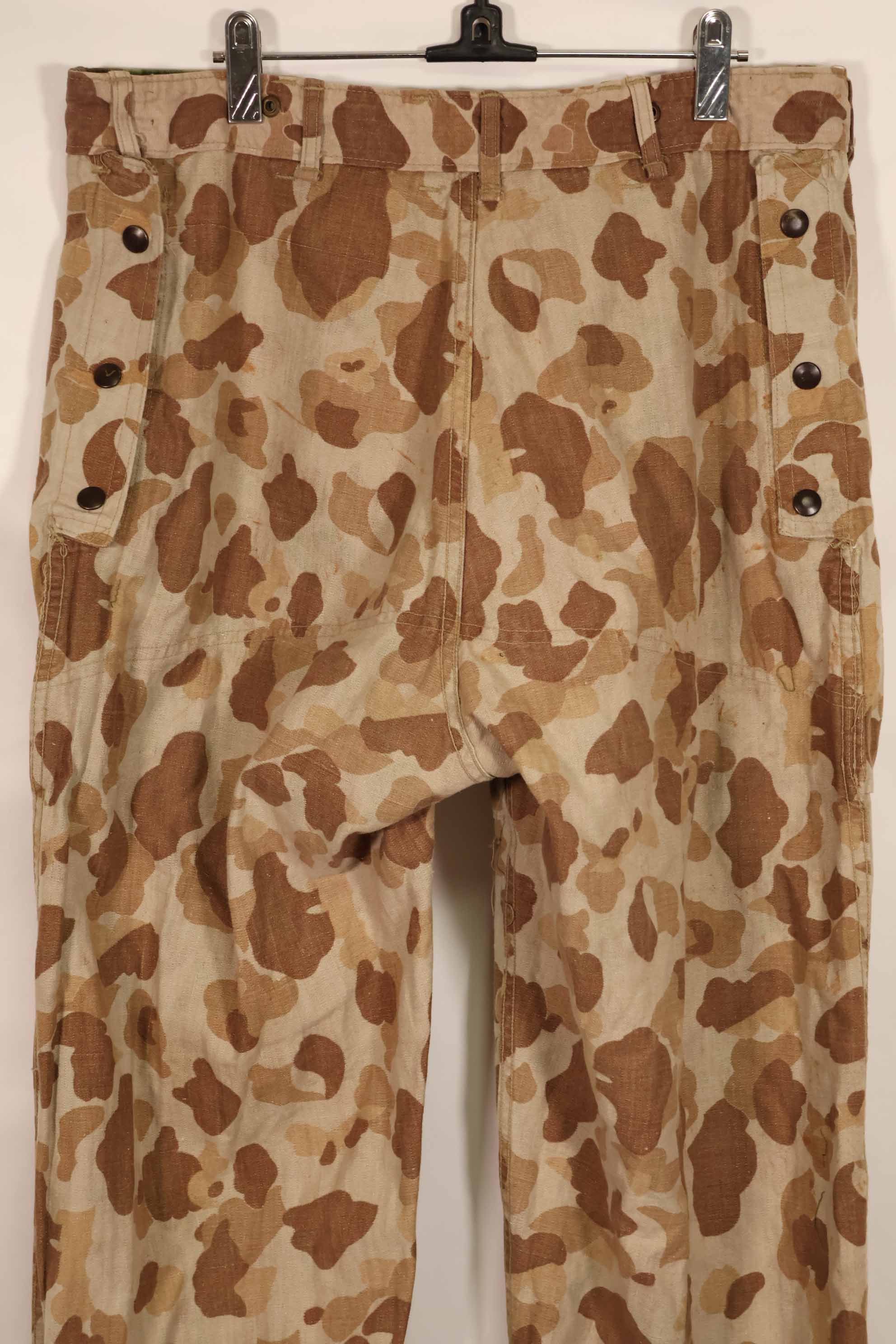 Real 1940s WWII U.S. Marine Corps P44 grogskin camouflage pants, used.