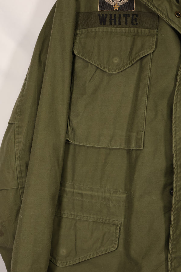 Real owned by former SF member, first model M65 field jacket, estimated 1965-1966, used.