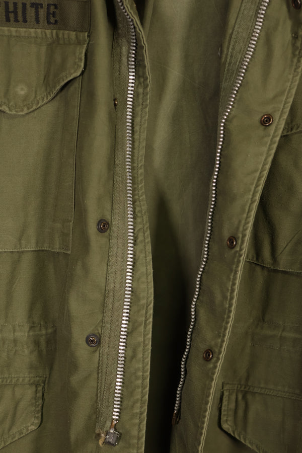 Real owned by former SF member, first model M65 field jacket, estimated 1965-1966, used.