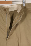 1960s, estimated 34-36 US Army cotton khaki pants, used.