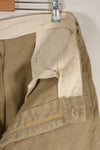 1960s, estimated 34-36 US Army cotton khaki pants, used.