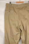 1960s, estimated 34-36 US Army cotton khaki pants, used.