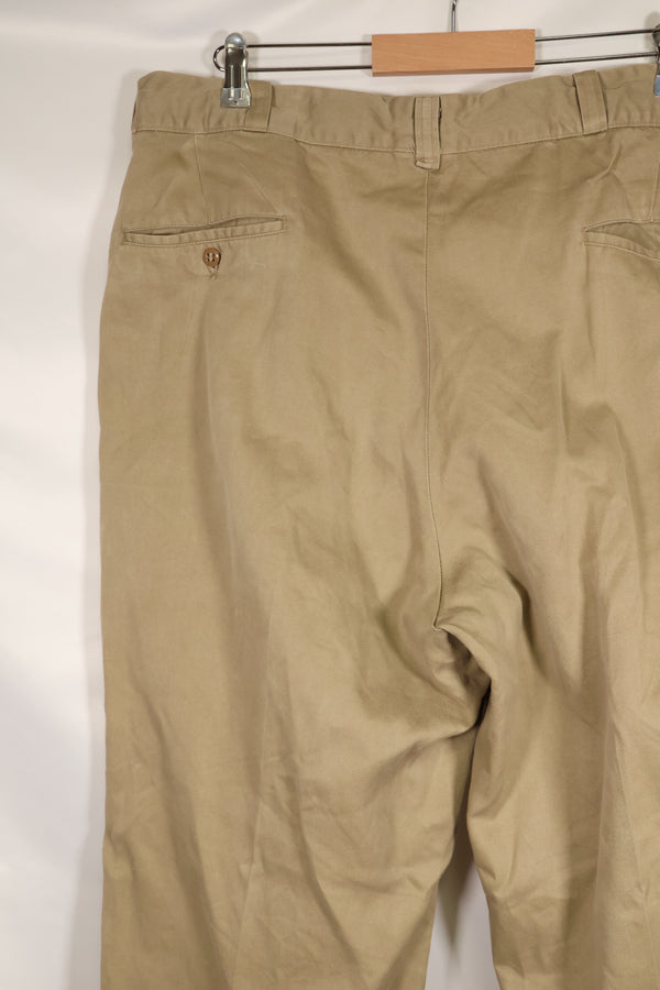 1960s, estimated 34-36 US Army cotton khaki pants, used.