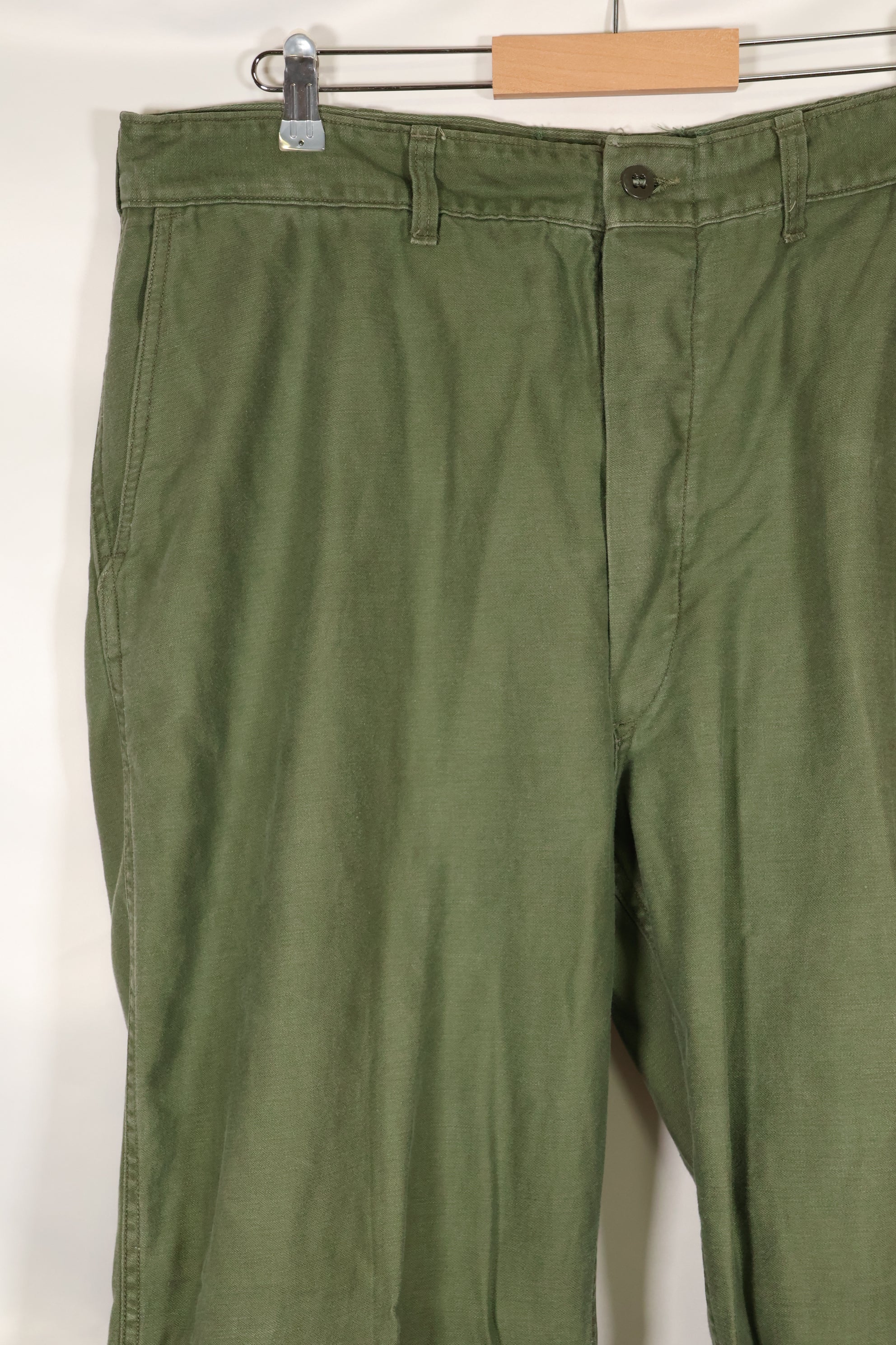 1960s lot, estimated 36 approx USMC P-56 utility pants, used.