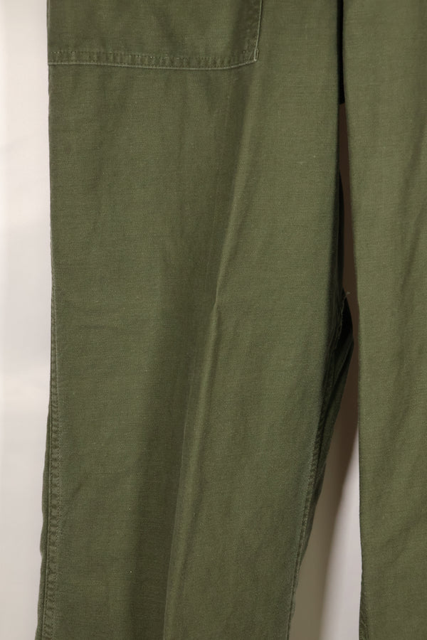Early 1960s, estimated 34 OG-107 utility pants, baker pants, used.