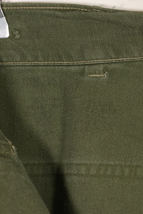 Early 1960s, estimated 34 OG-107 utility pants, baker pants, used.
