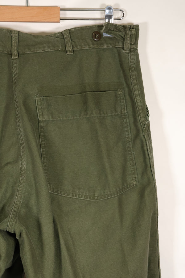 Early 1960s, estimated 34 OG-107 utility pants, baker pants, used.