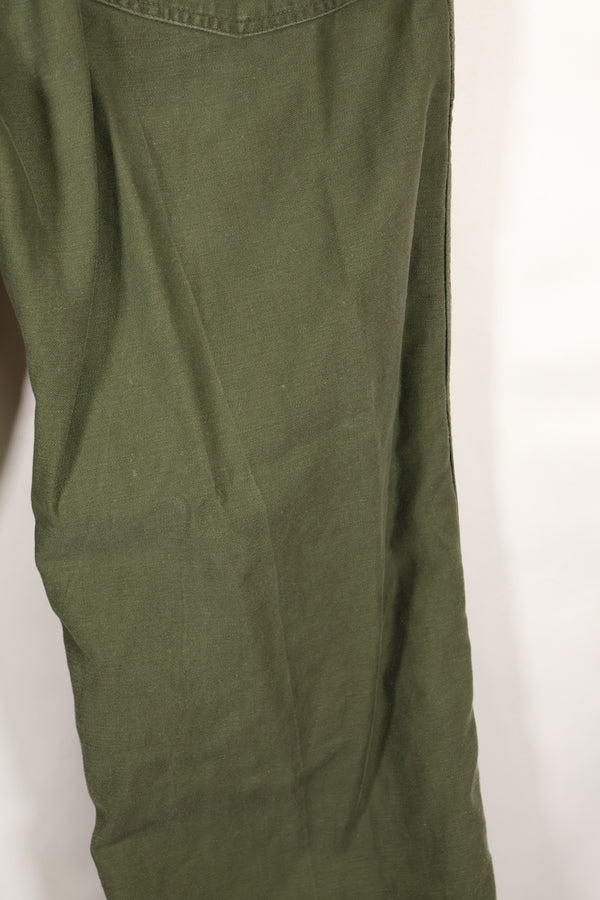 Early 1960s, estimated 34 OG-107 utility pants, baker pants, used.