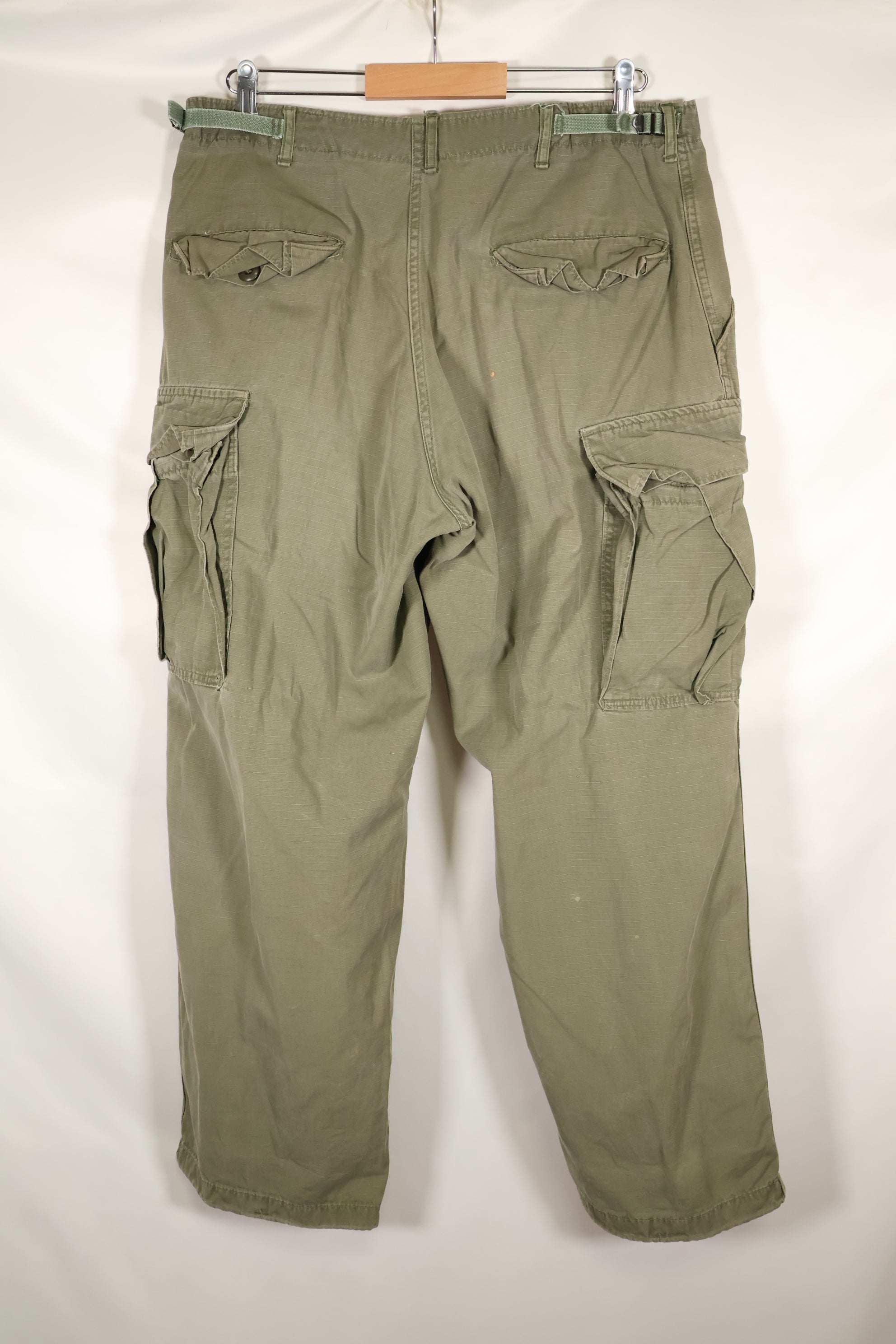 1969 Contract M-R 4th Model Jungle Fatigue Pants, stained, faded, used.