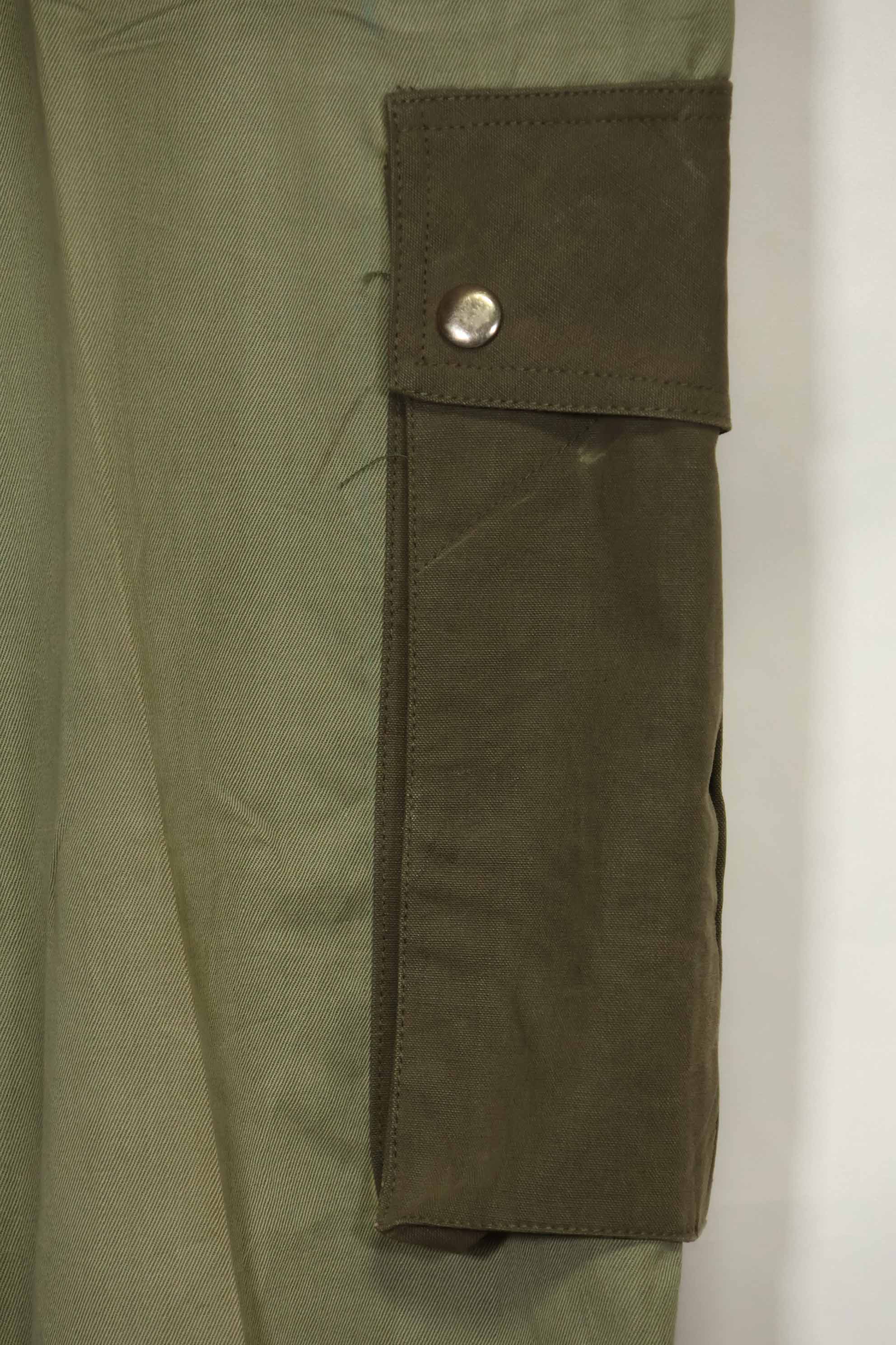 1940s-50s U.S. Army M45 cotton field pants with modified cargo pockets, airborne use, used, A