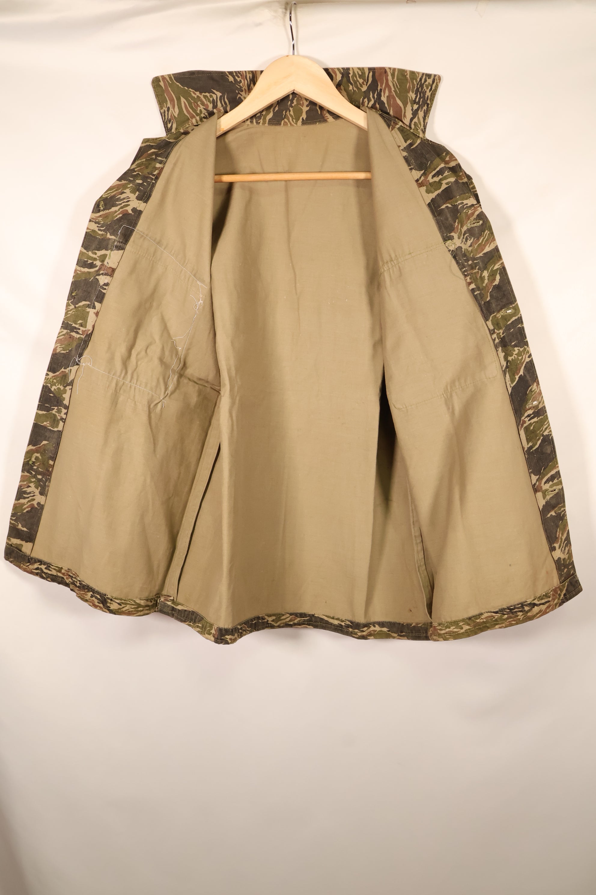 Late 1960s | Locally made | Estimated to be made in Vietnam or Thailand | Tiger-striped shirt | Used