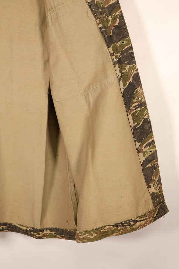 Late 1960s | Locally made | Estimated to be made in Vietnam or Thailand | Tiger-striped shirt | Used