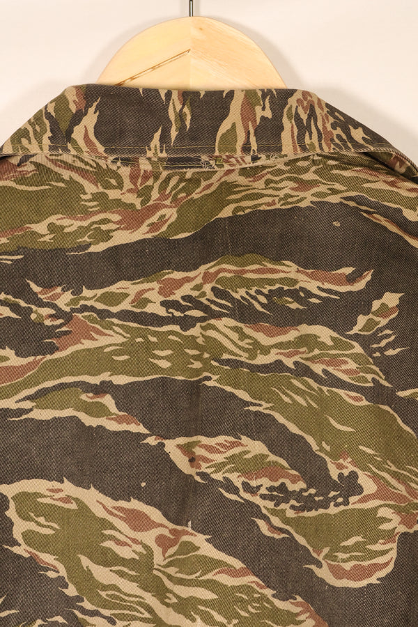 Late 1960s | Locally made | Estimated to be made in Vietnam or Thailand | Tiger-striped shirt | Used