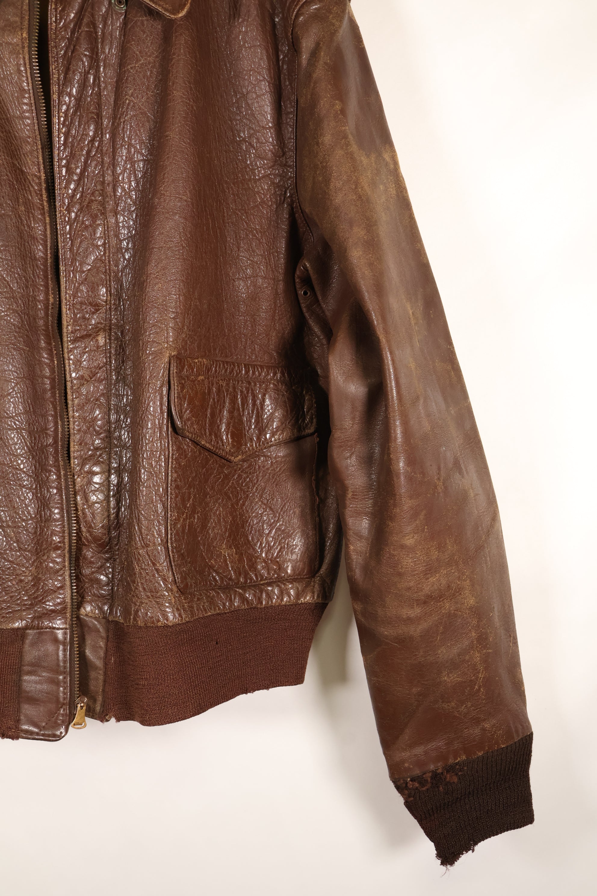 1940s size 42 WWII U.S. Army Air Corps USAAF A-2 flight jacket with name, used.