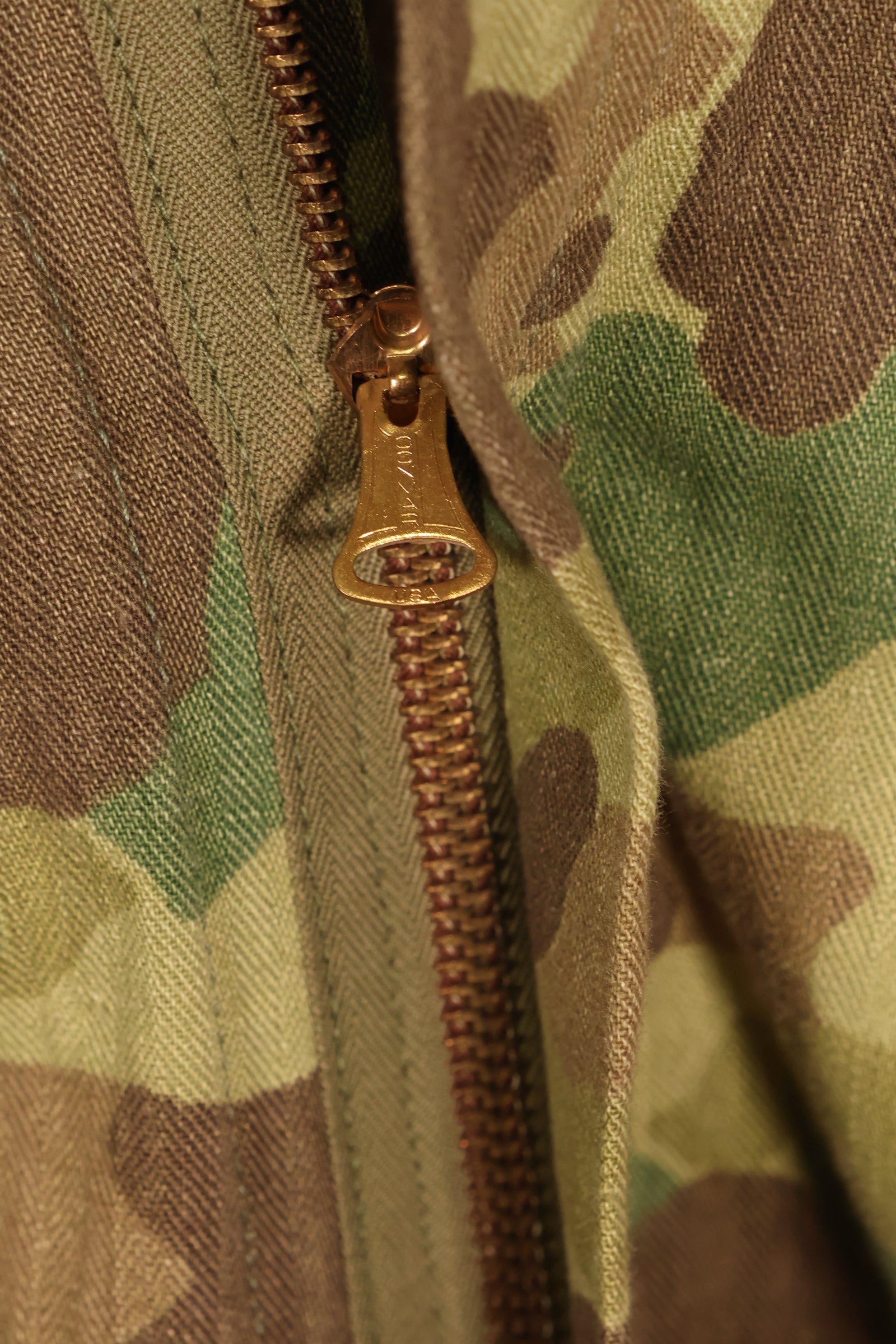 1940s U.S. Army & Marine Corps Frogskin camouflage coveralls in good condition.