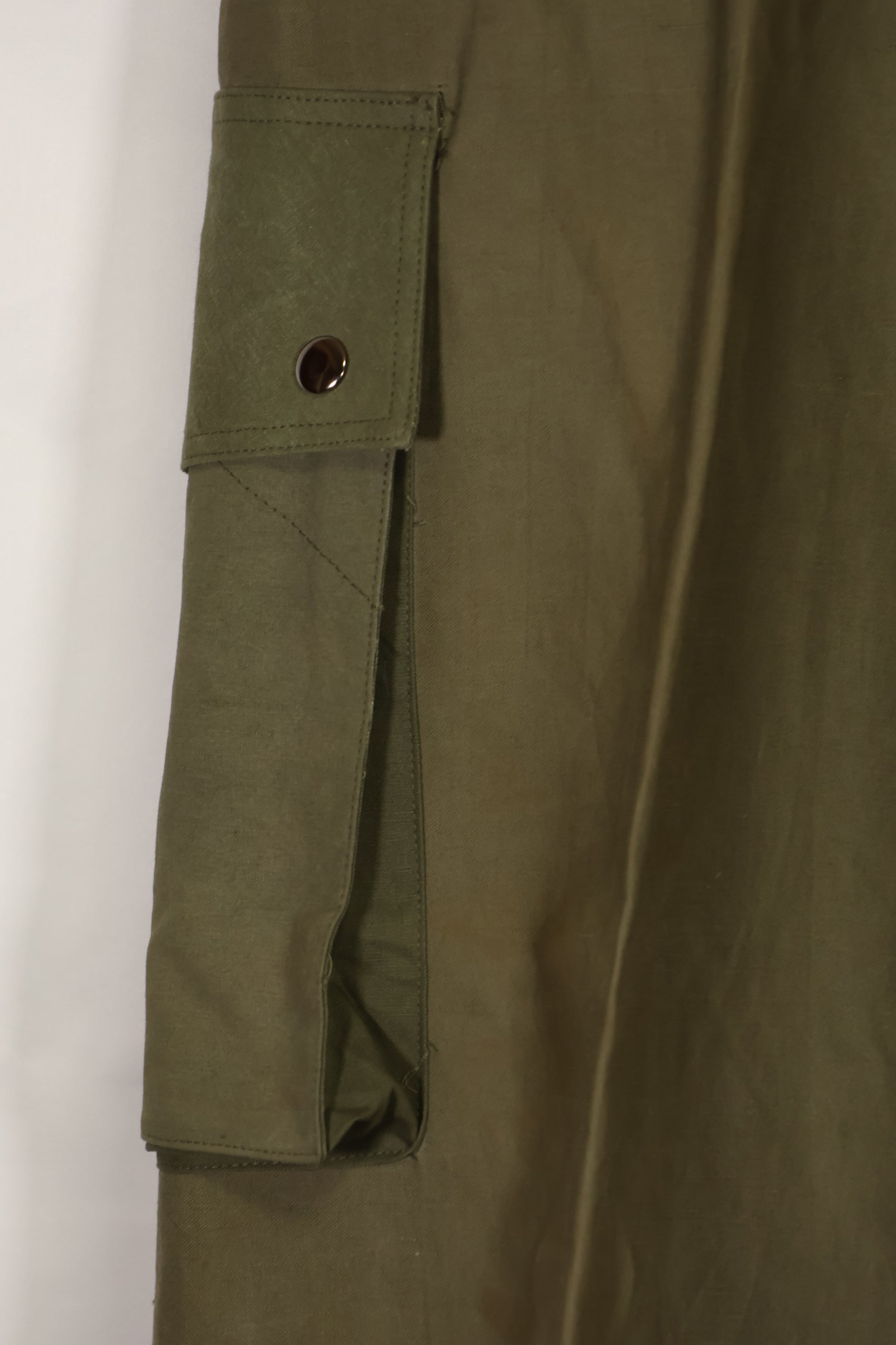 Real U.S. Army M45 pants with additional pocket modification, used.