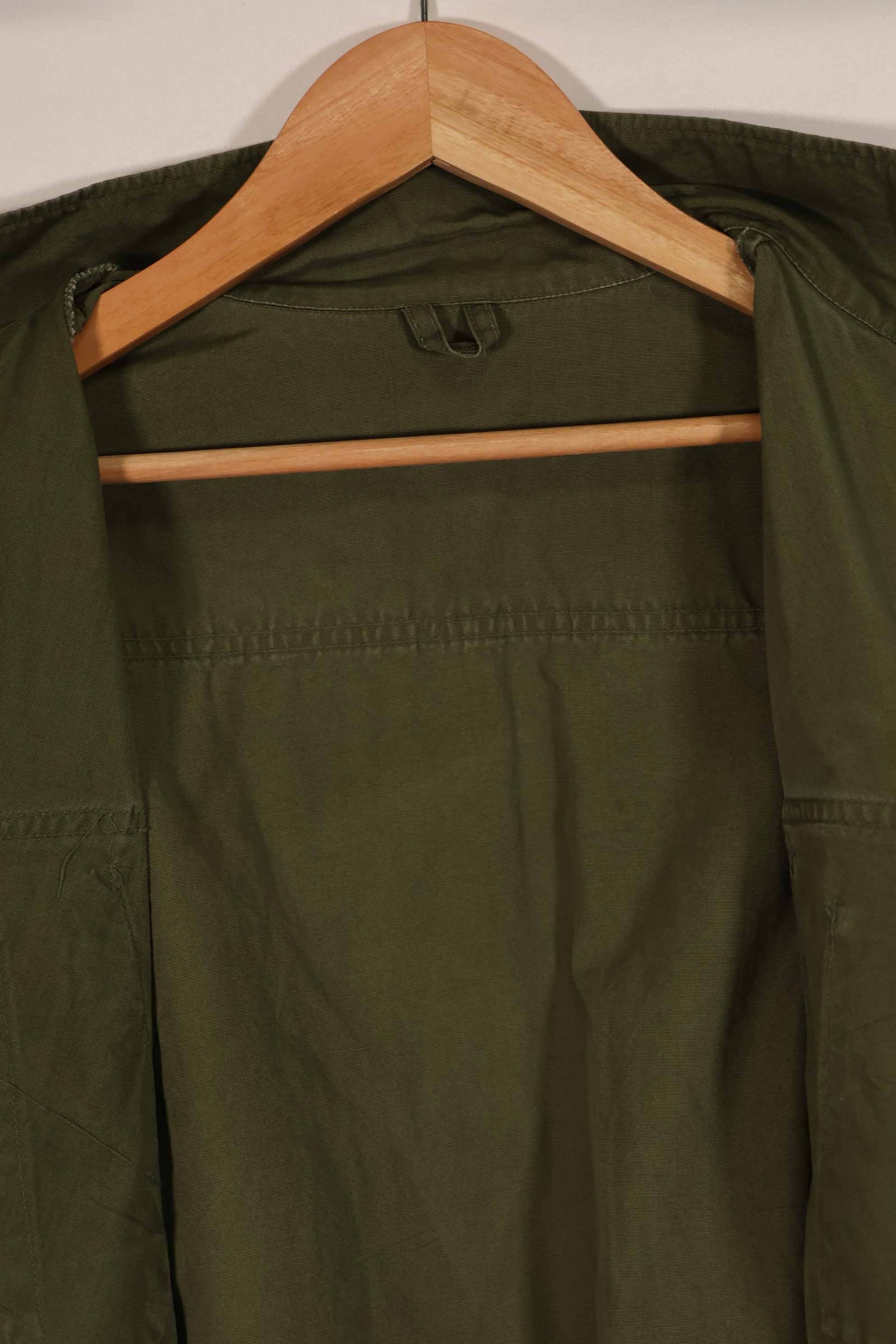 Real unknown year of manufacture 3rd Model Jungle Fatigue Jacket, no size tag, used.