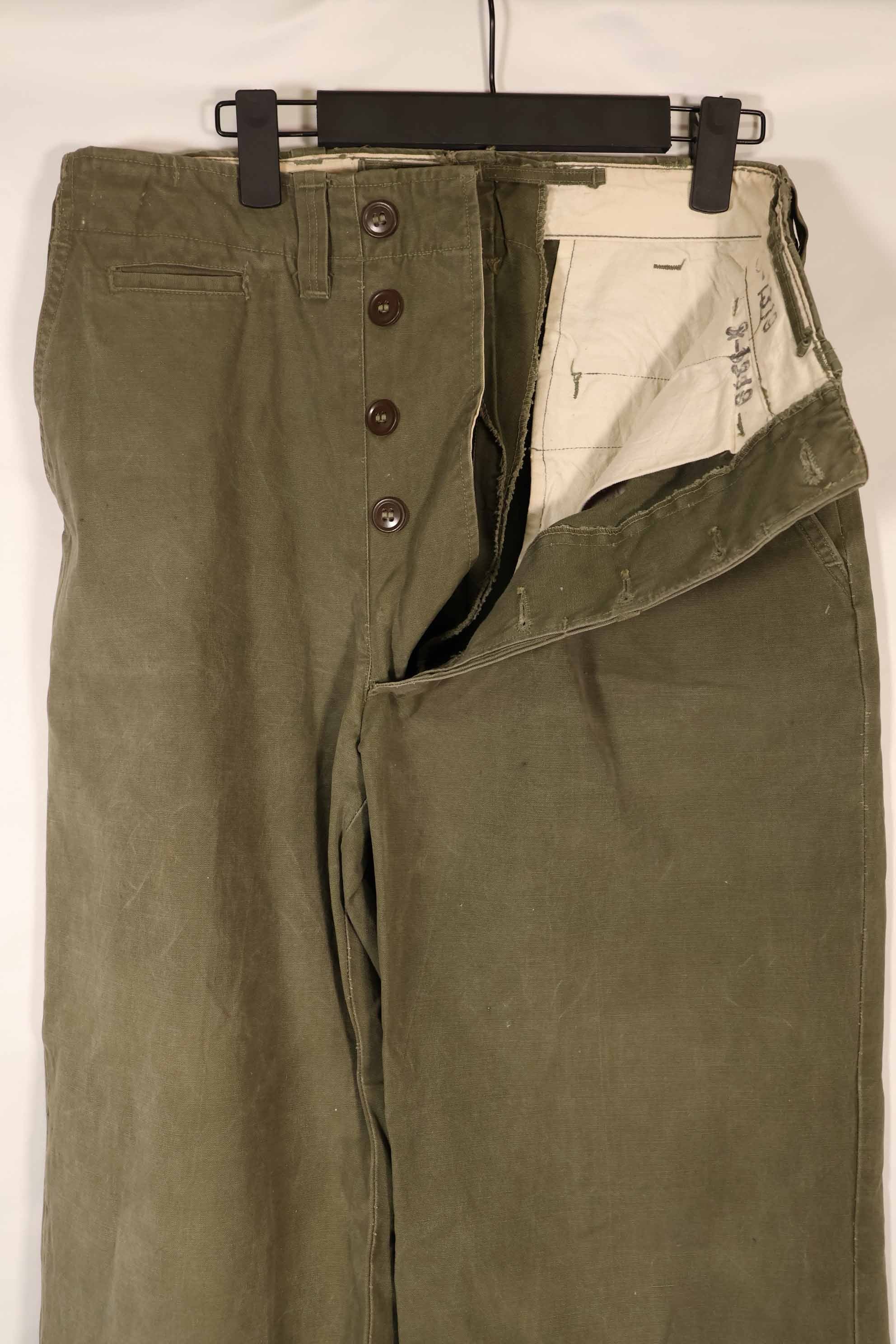 Real 1940s U.S. Army M45 cotton field pants, used.