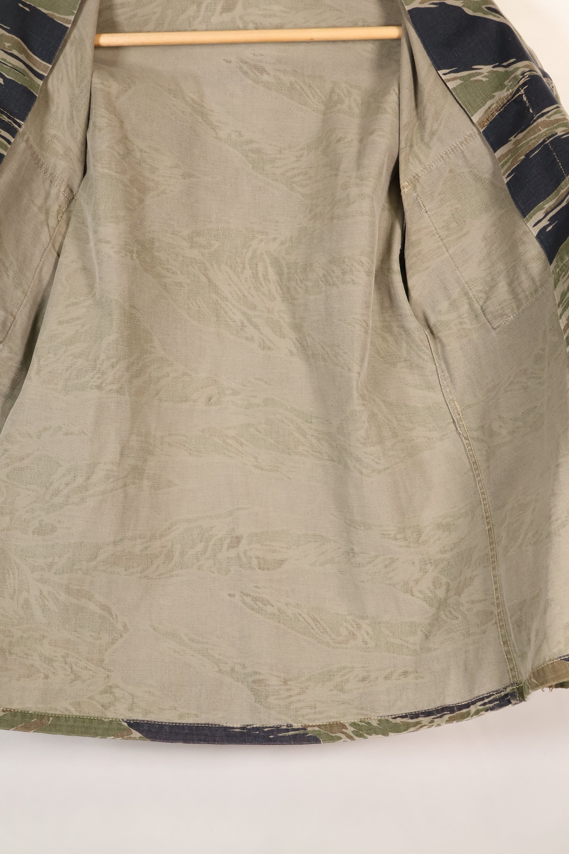 Mid-1960s Japanese Silver Tiger Asian Cut shirt with faded tiger stripes, used.